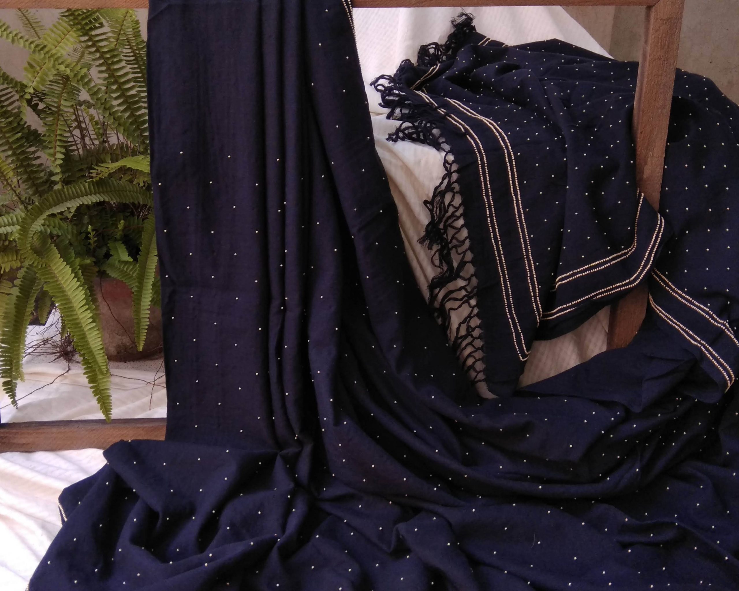 Charcoal and pearl: A luxury saree